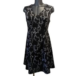 Penningtons black floral fit and flare dress size X